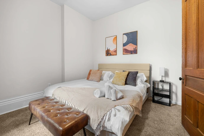Queen bedroom with comfortable bed linen